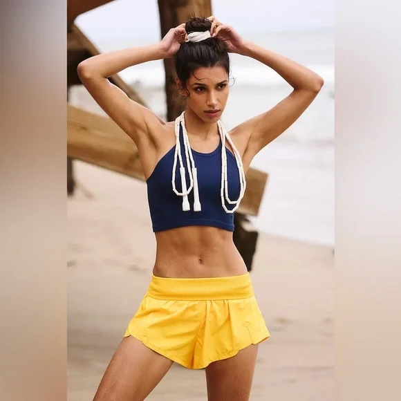 Free People Movement Carpe Diem Shorts in Yellow. - Picture 3 of 6